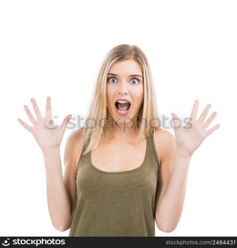Beautiful blonde woman astonished with something with hands on the air, isolated over white background
