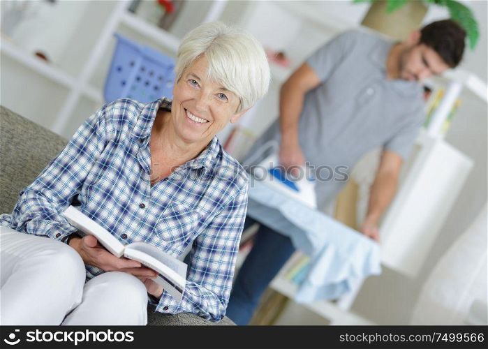 beautiful blonde woman reading a book