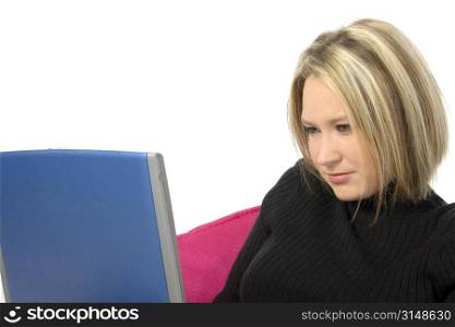 Beautiful blonde woman working on laptop.