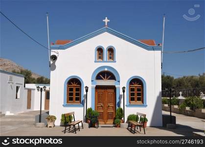 beautiful blue and white church in Pserimos island, Greece