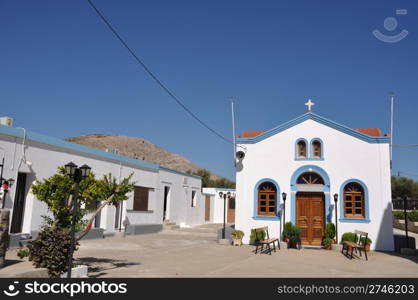 beautiful blue and white church in Pserimos island, Greece (gorgeous blue sky)