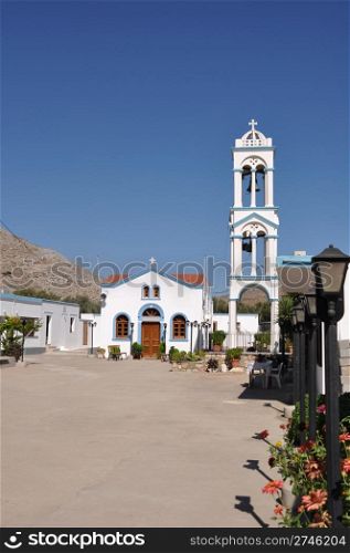 beautiful blue and white church/tower in Pserimos island, Greece (gorgeous blue sky)