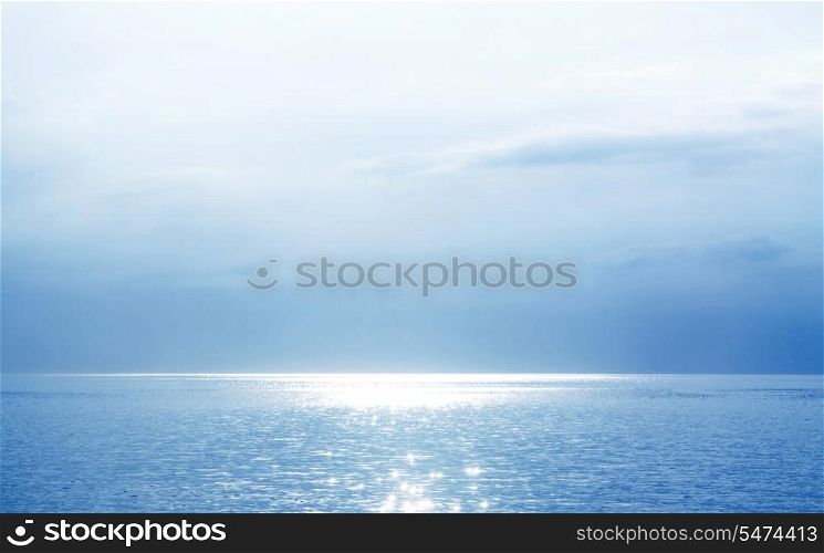 Beautiful Blue Seascape With The Sun Glittering Water
