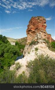 Beautiful blue skies above the rock butte at a Wyoming landmark