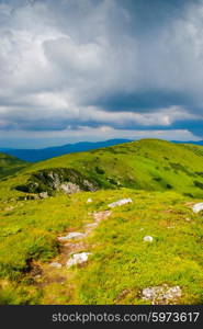 Beautiful blue sky and glade high up in Carpathian mountains. Beautiful mountain landscape