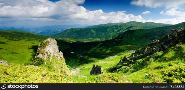 Beautiful blue sky and rock high up in Carpathian mountains, Czarnohora ridge