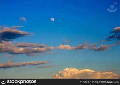 Beautiful blue sky at dusk with full moon