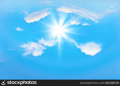 Beautiful blue sky. Beautiful blue sky with sunbeams and clouds. Sun rays.