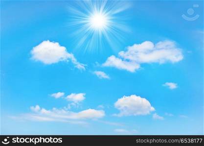 Beautiful blue sky. Beautiful blue sky with sunbeams and clouds. Sun rays.