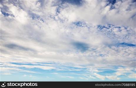 Beautiful blue sky with clouds as a natural background