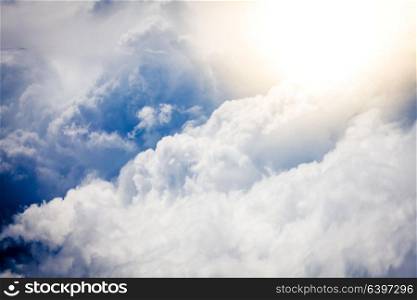 Beautiful blue sky with fluffy clouds. Bright light of heaven. Walk to the heaven