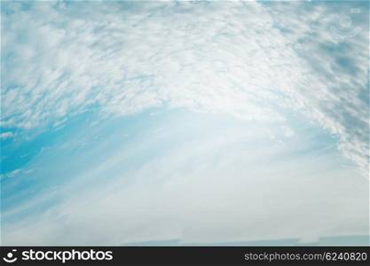 Beautiful blue sky with Flying Spindrift clouds , outdoor nature background