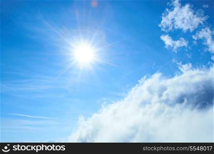 Beautiful blue sky with sun and clouds