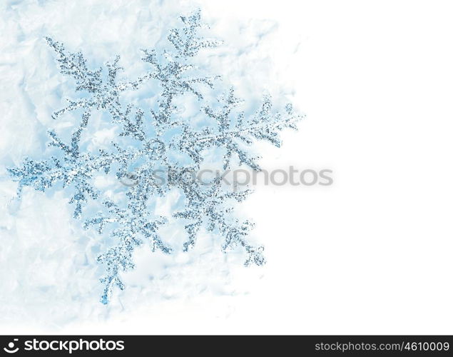 Beautiful blue snowflake isolated, winter holiday background with copy space