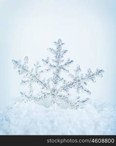 Beautiful blue snowflake winter holiday background