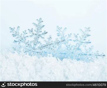 Beautiful blue snowflake winter holiday background
