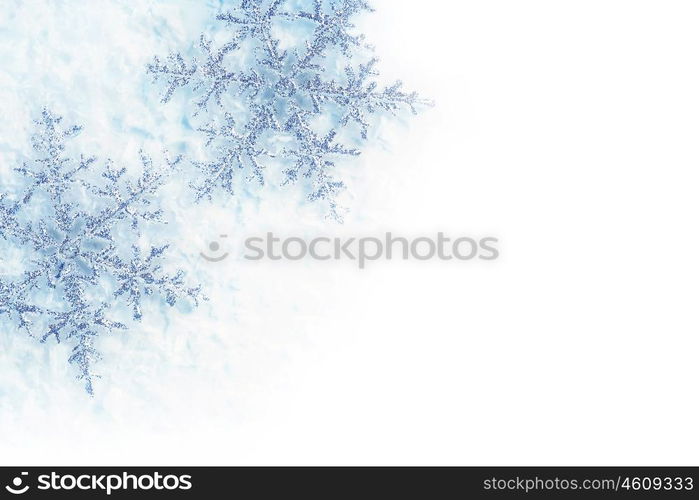 Beautiful blue snowflakes isolated, winter holiday background with copy space