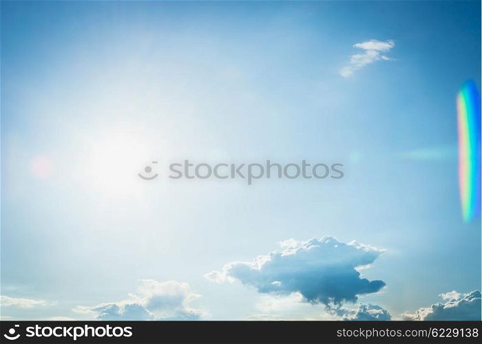 Beautiful blue summer sky with sun and small clouds. Sky Nature background