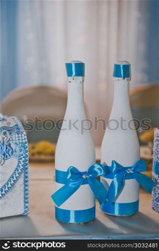Beautiful bottles decorated with ribbons for wedding.. Decorated champagne bottles for the wedding 731.. Decorated champagne bottles for the wedding 731.