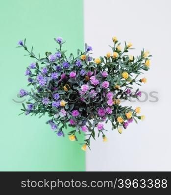 Beautiful bouquet of flower on green and white color background