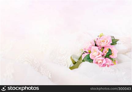 Beautiful bouquet of fresh roses on a white drapery. bouquet of fresh roses