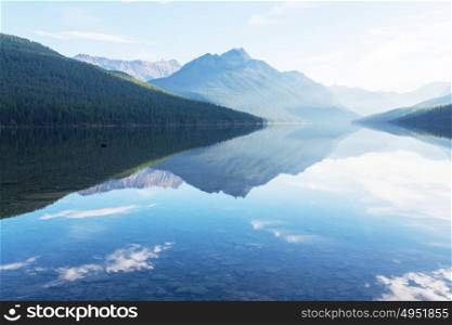 Beautiful Bowman lake with reflection of the spectacular mountains in Glacier National Park, Montana, USA. Instagram filter.
