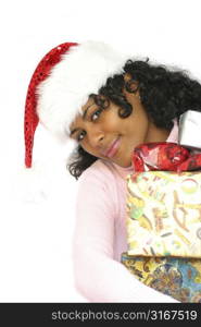 Beautiful brazilian girl holding christmas presents