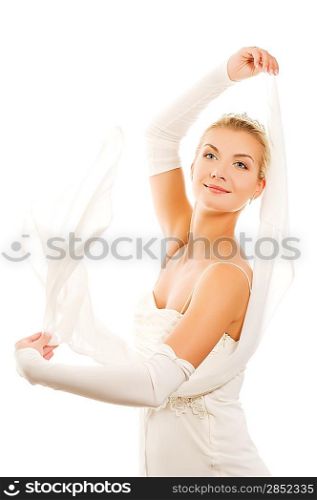 Beautiful bride dancing with veil