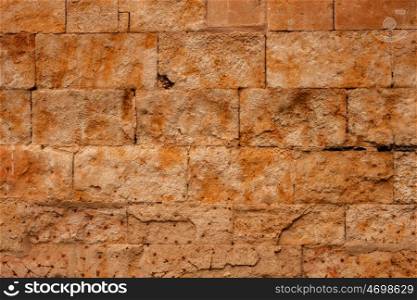 Beautiful brown wall with rectangular stones for background