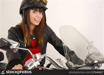 Beautiful Brunette Biker Holding the Handlebars V-Twin Motorcycle. Beautiful Brunette