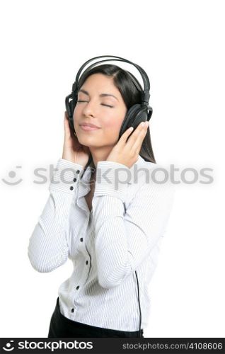 Beautiful brunette businesswoman hearing music on headphones