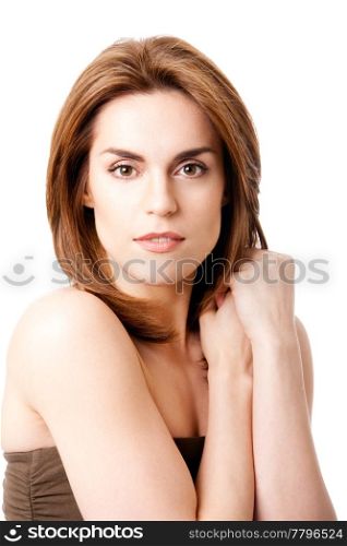Beautiful brunette face, natural and pure, with hands in her neck, isolated