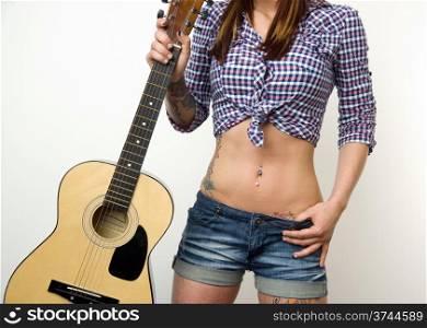 Beautiful Brunette Female Torso Holding Acoustic Guitar. Beautiful Brunette
