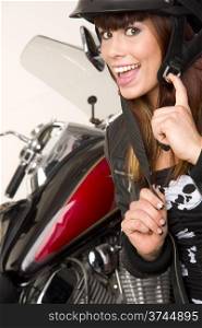 Beautiful Brunette Gets Geared up For Motorcycle Ride. Beautiful Brunette