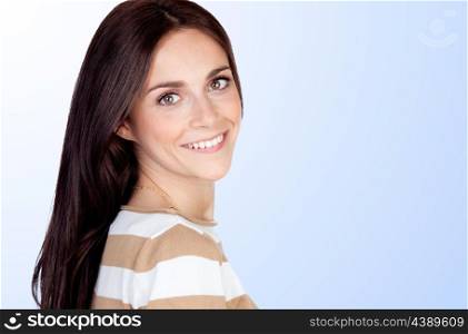 Beautiful brunette girl isolated on a over blue background