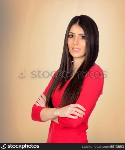 Beautiful brunette girl isolated on a over yellow background