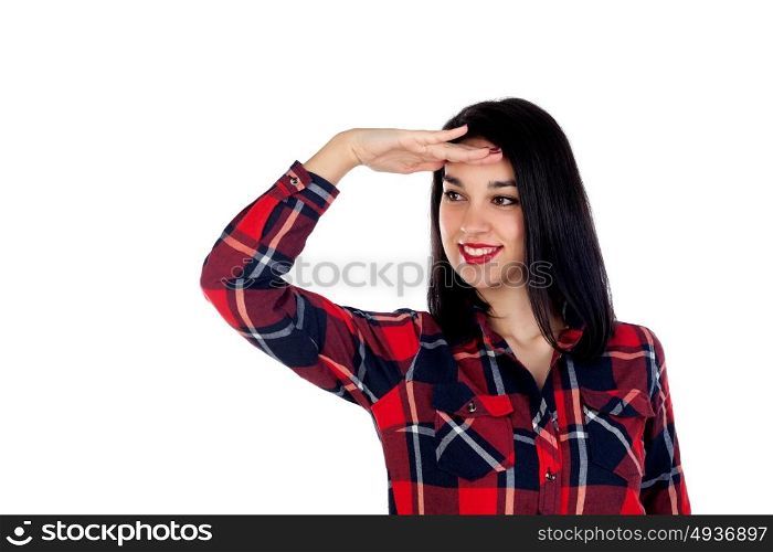 Beautiful brunette girl looking something with her hand in the forehead isolated on white background
