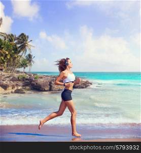 Beautiful brunette girl running in Caribbean beach photo mount