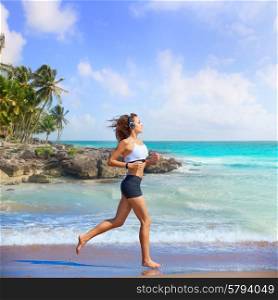 Beautiful brunette girl running in Caribbean beach photo mount
