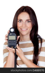 Beautiful brunette girl with a photometer isolated on a over white background