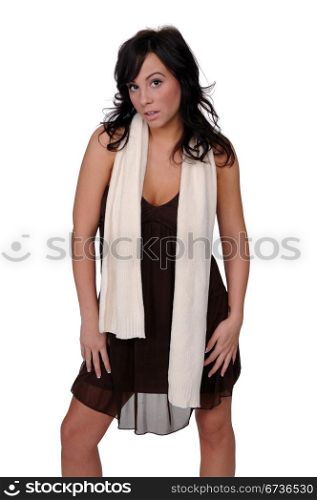 Beautiful brunette in a brown dress and a white scarf