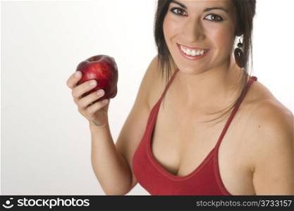 Beautiful Brunette readies to bite into an Apple. Beautiful Brunette with RED Apple