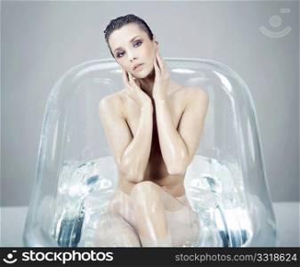 Beautiful brunette relaxing in bath