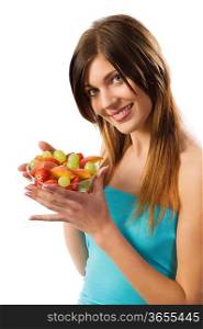 beautiful brunette smiing and looking in camera with a salad fruit