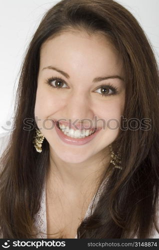 Beautiful brunette teen girl with fantastic smile.