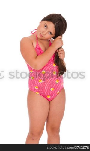 beautiful brunette teenage girl in swimsuit holding hair (isolated on white background)