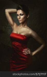 beautiful brunette woman in red dress