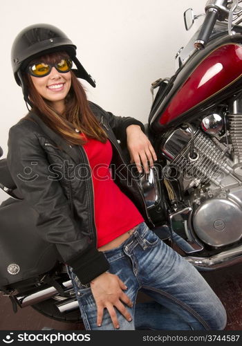 Beautiful Brunette woman Outfitted for a Motorcycle Ride. Beautiful Brunette