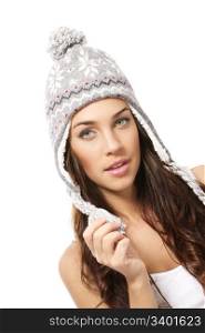 beautiful brunette woman wearing winter cap. beautiful brunette woman wearing winter cap on white background