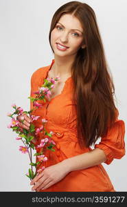Beautiful brunette woman with a flowers